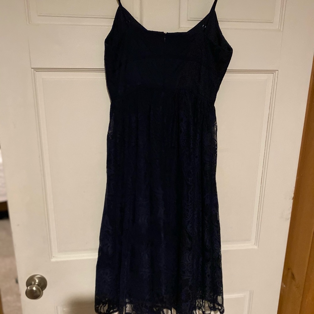 Navy blue lace covered party dress. Size 2. Worn once— perfect condition.